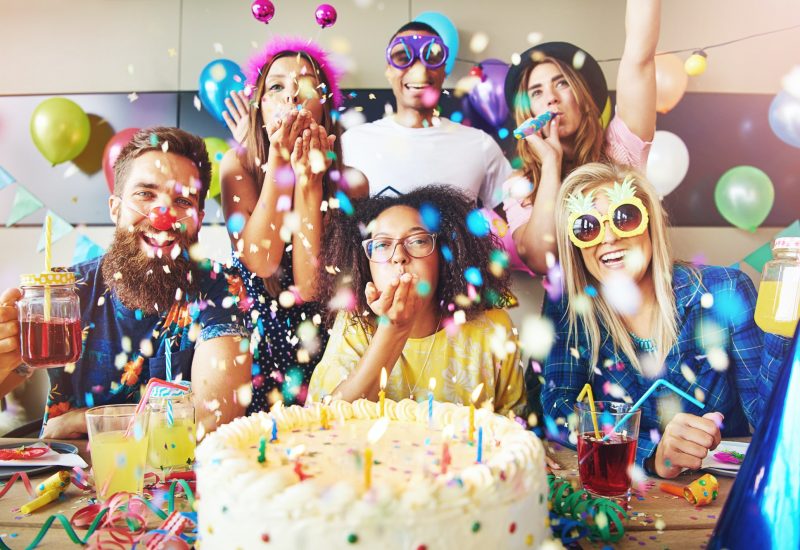 confetti-flying-around-group-celebrating-a-party.jpg